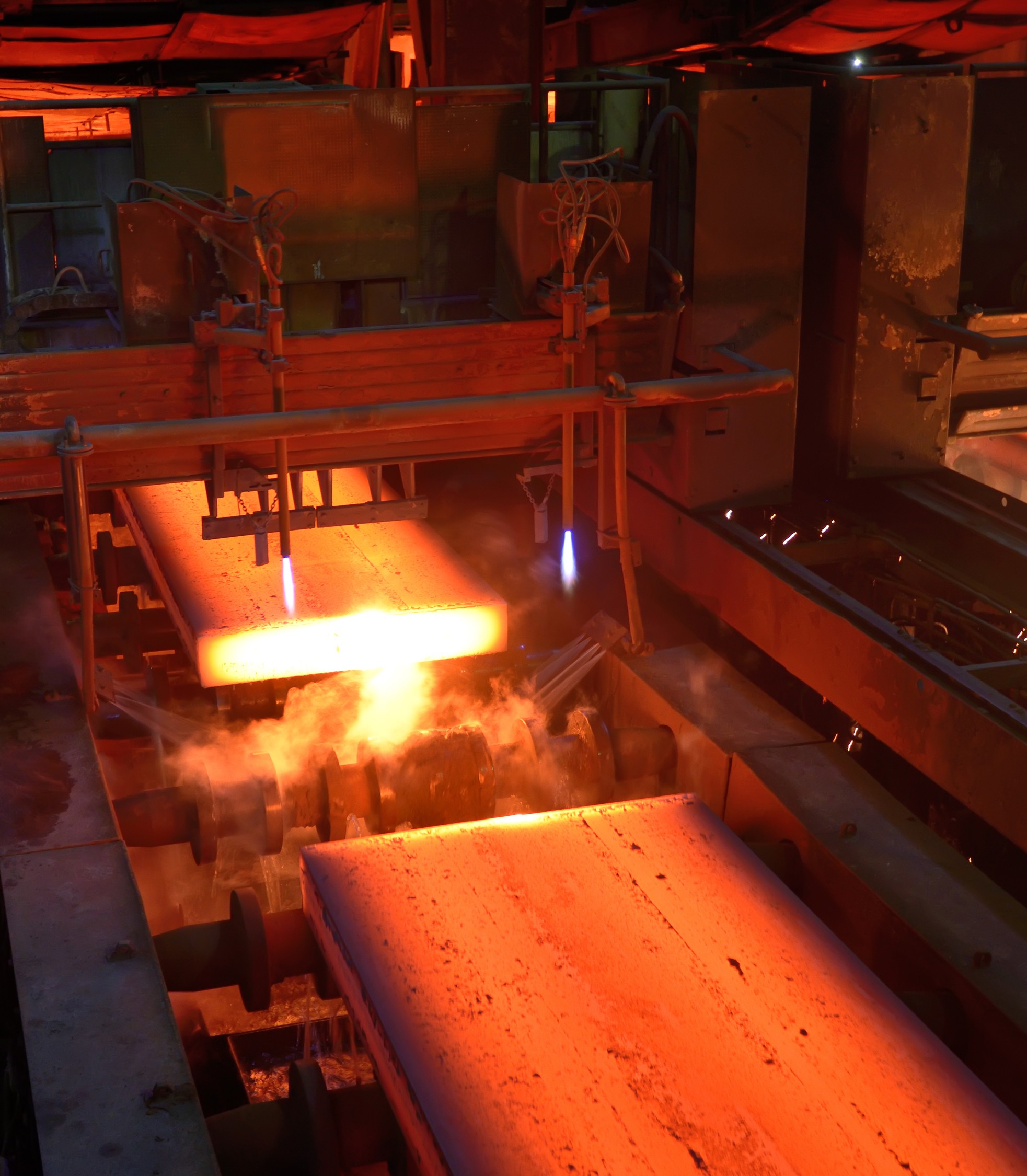Hot steel slab processing in SSAB plant powered by hydrogen-based fossil-free steel production technology.